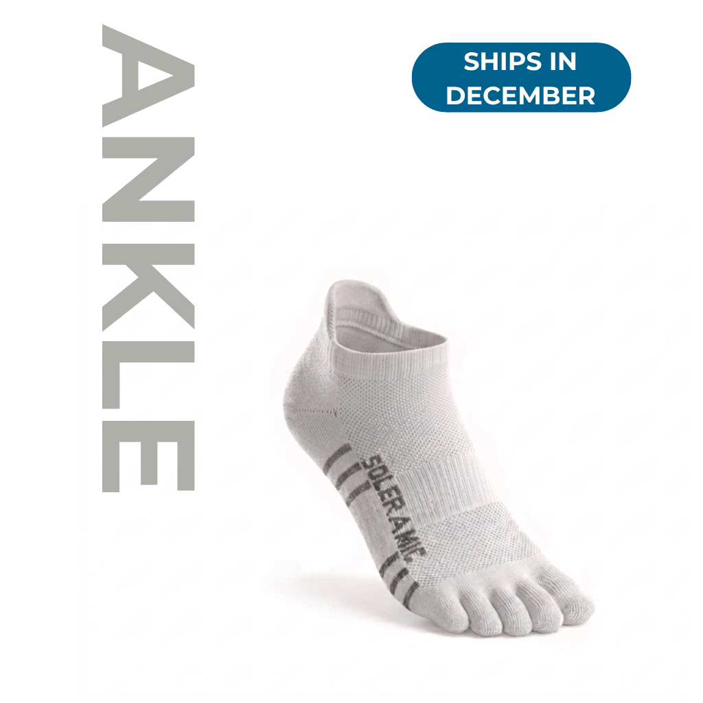 Solermic Performance Ankle Sock in black with cushioned sole and breathable fabric, designed for athletic comfort and support.