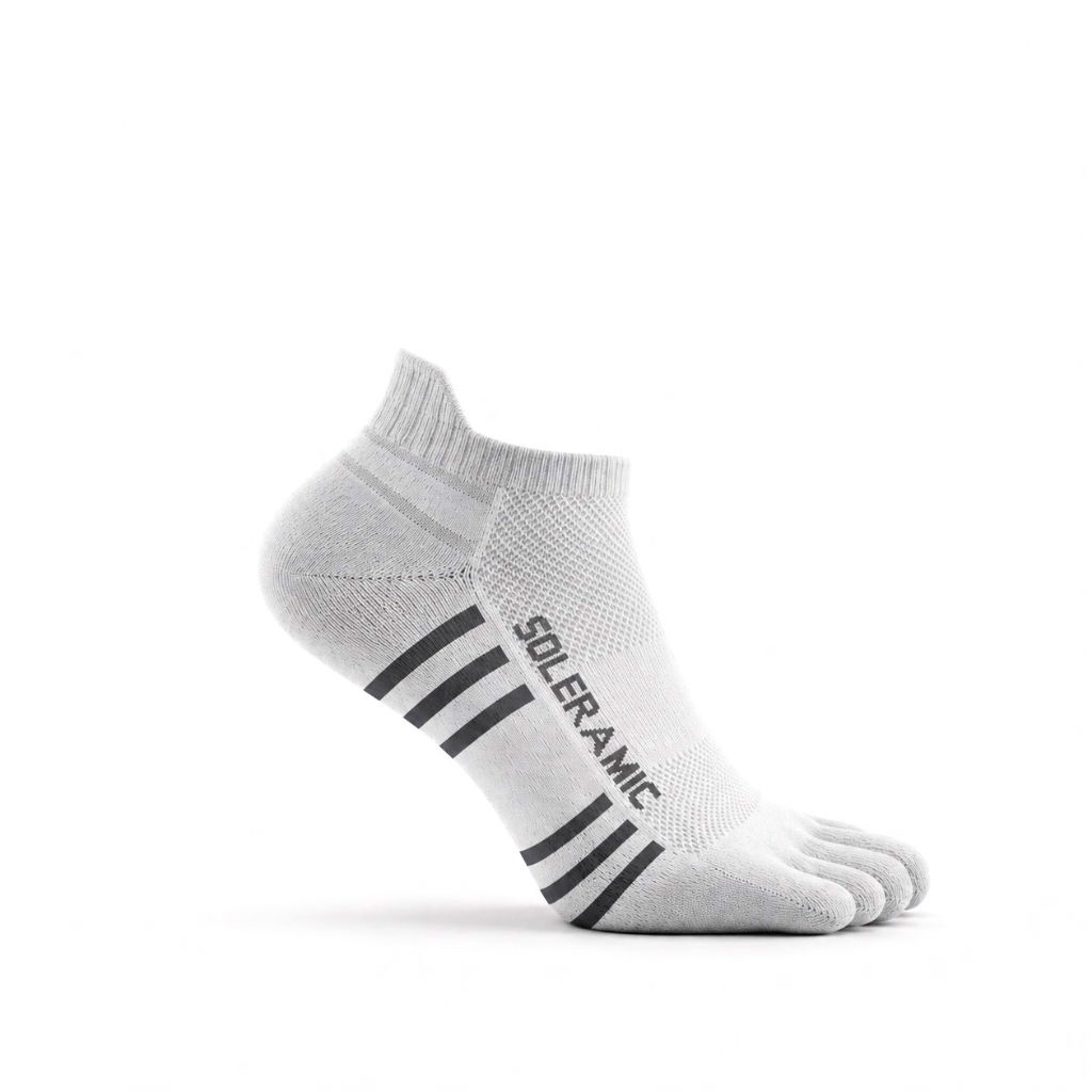 Soleramic Performance Ankle Sock in black with cushioned sole and ribbed cuff, designed for athletic comfort and support.