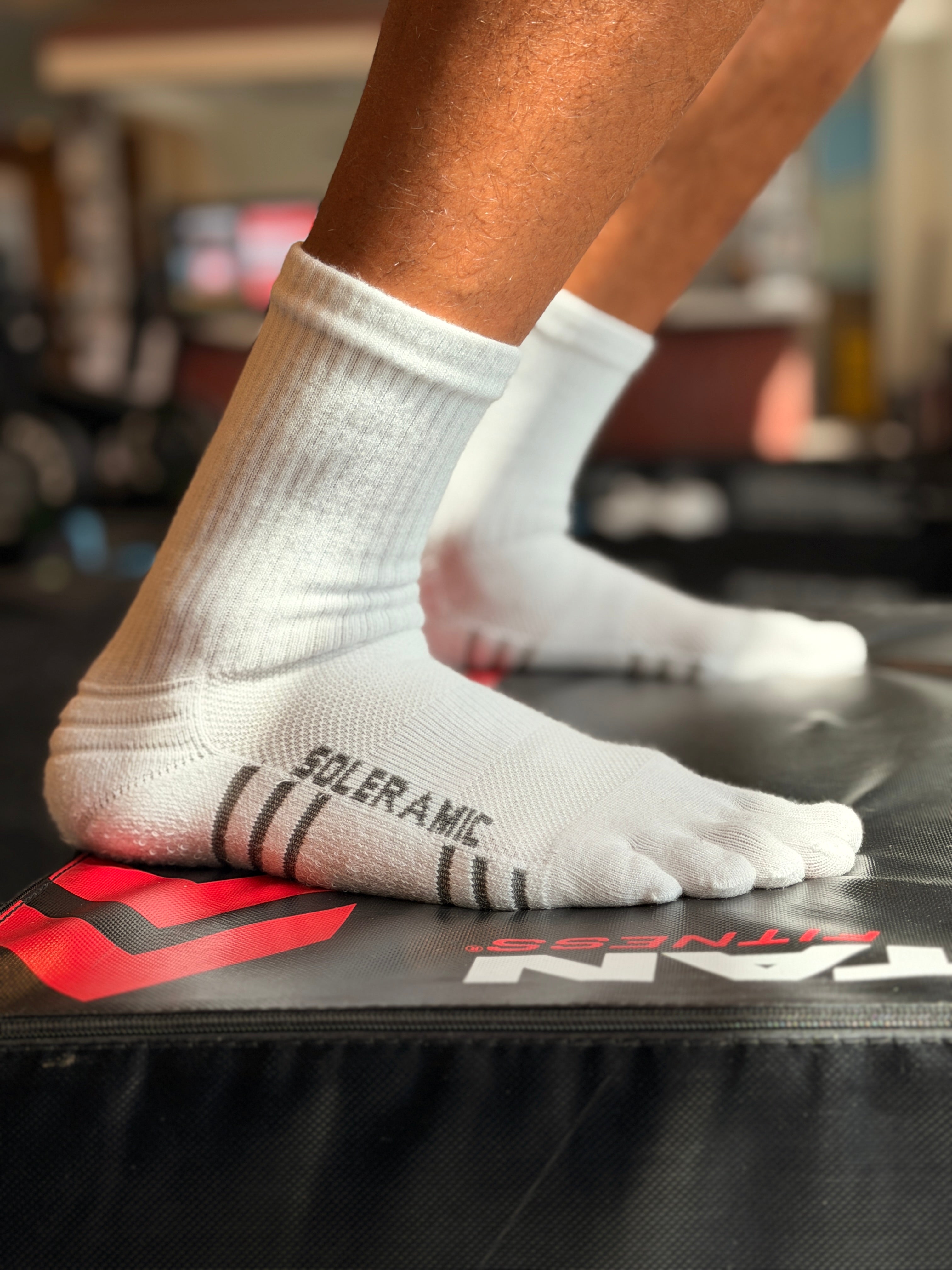 Soleramic Performance Crew Toe Sock featuring cushioned toe area and breathable fabric for athletic comfort.